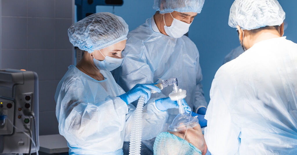 Anesthesiologists in operating room